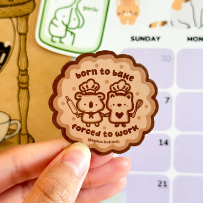 Magnet in a shape of a cookie saying born ot bake, forced to work.